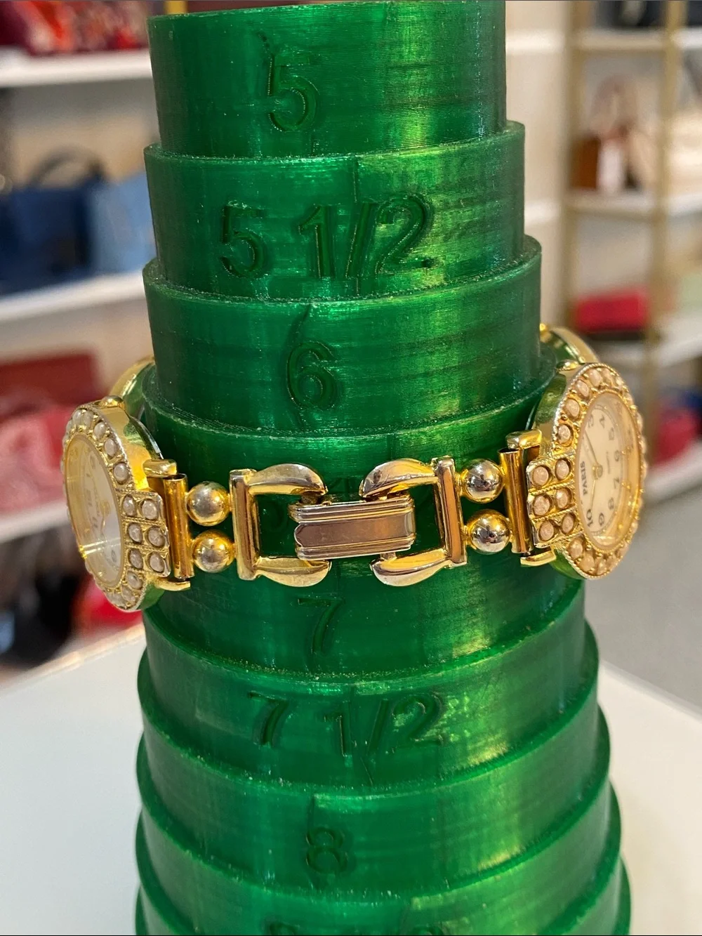 Faux pearl gold tone watch